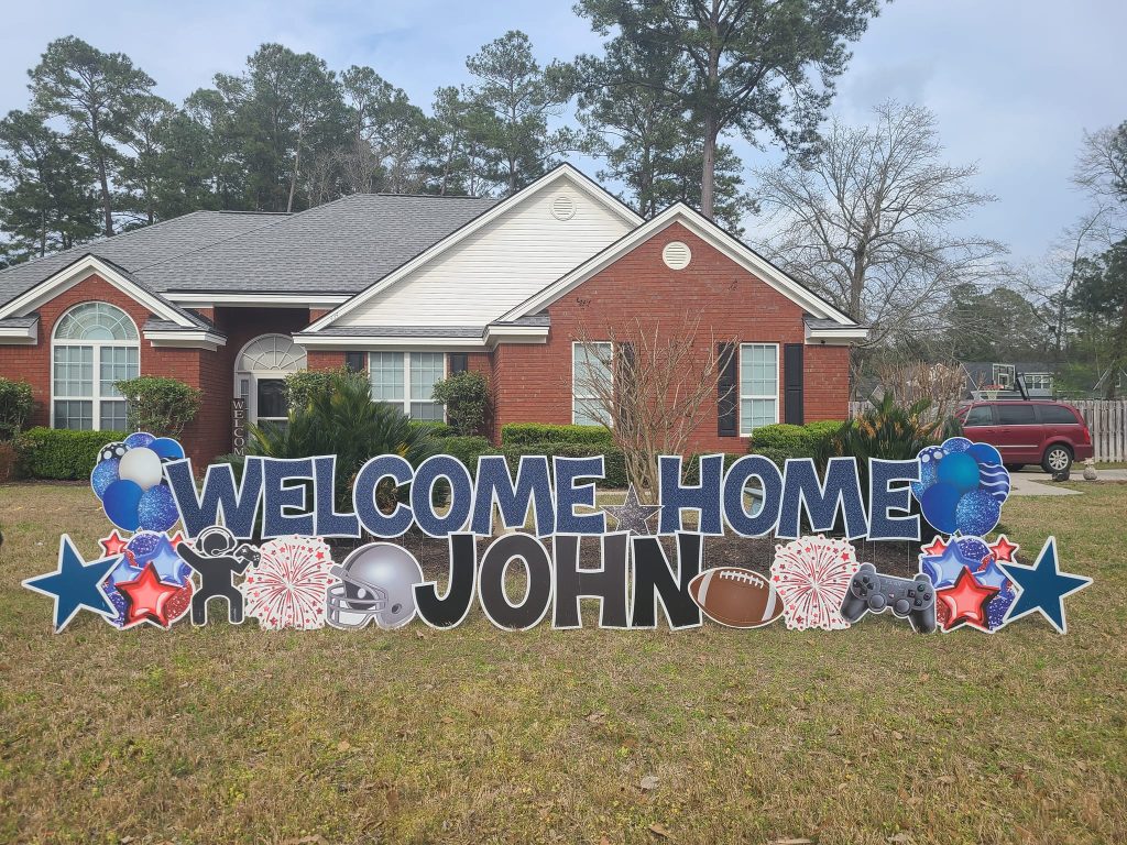 Welcome Home John yard sign